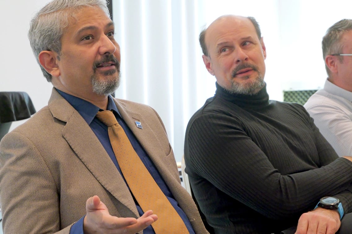 Business leadership discussion — image from TAB US